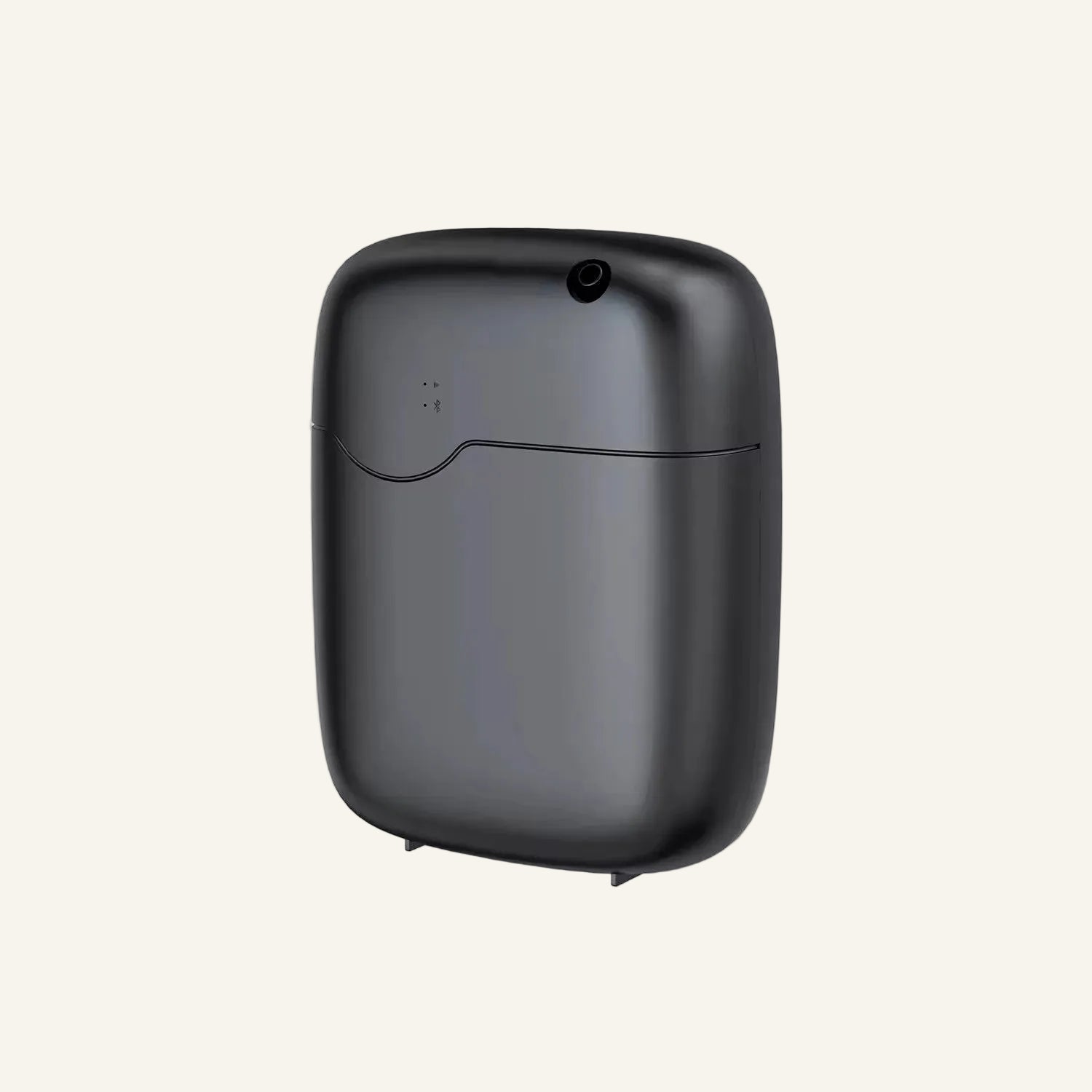 The back of our Black Copalli Home Diffuser shown from a side profile, featuring a compact, rounded waterless design. 