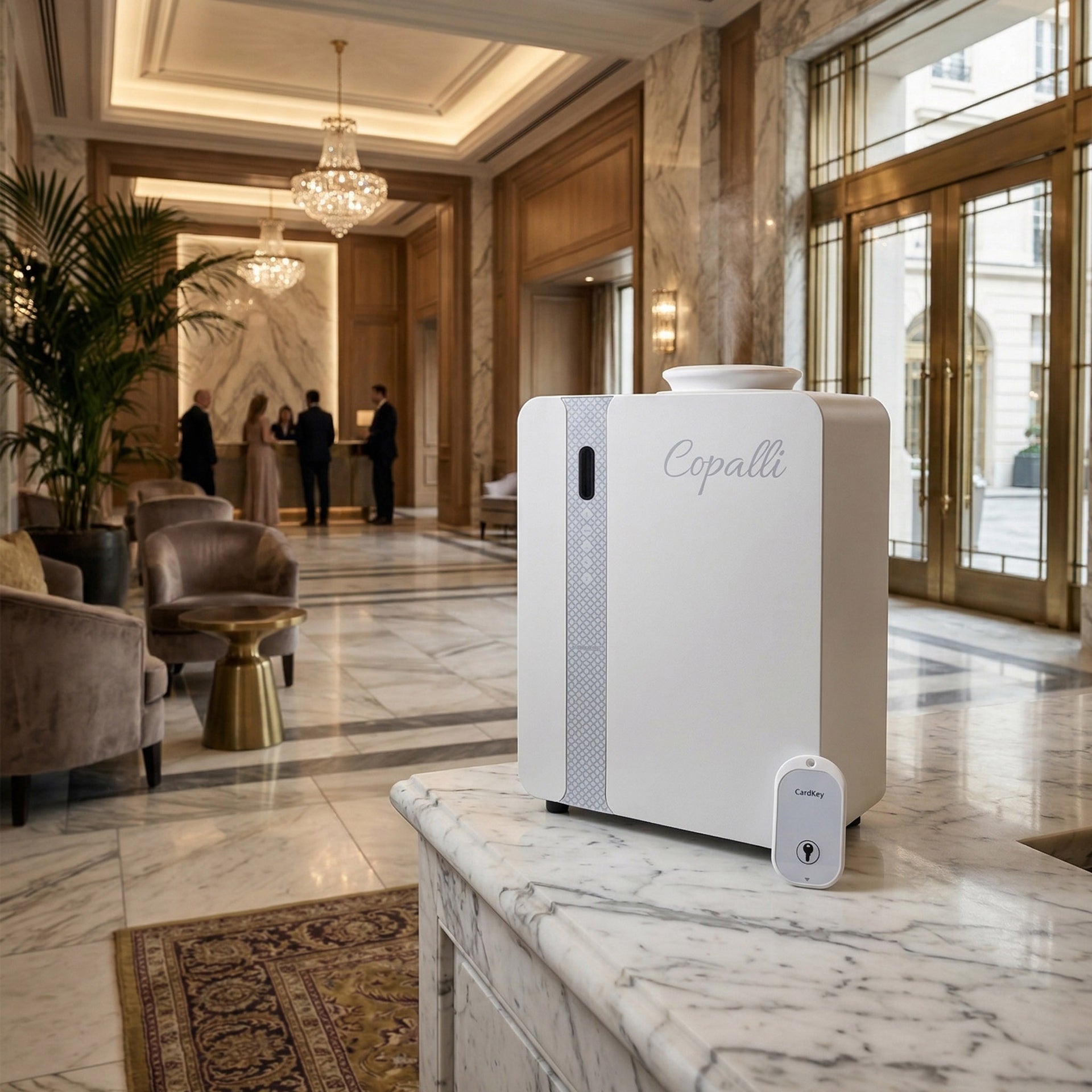 Our white Copalli Pro Plus Diffuser elegantly placed on a marble countertop in a luxury hotel lobby, showcasing its sleek industrial design in a professional setting.